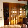 PUERTA PLEGABLE DE PVC LACADA CON VIDRIERAS